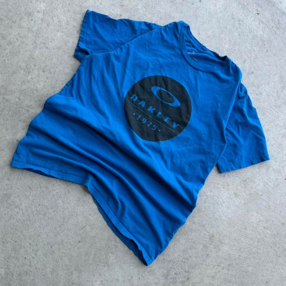 Vintage Oakley 1975 Blue T-shirt Essential - Picture 2 of 6